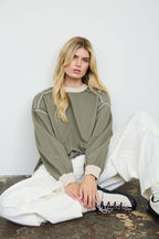 EXPOSED SEAM CONTRAST TRIM KNIT TOP