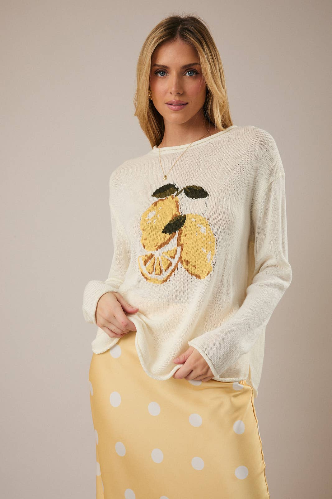 ROUND ROLL UP NECK LEMON GRAPHIC SWEATER