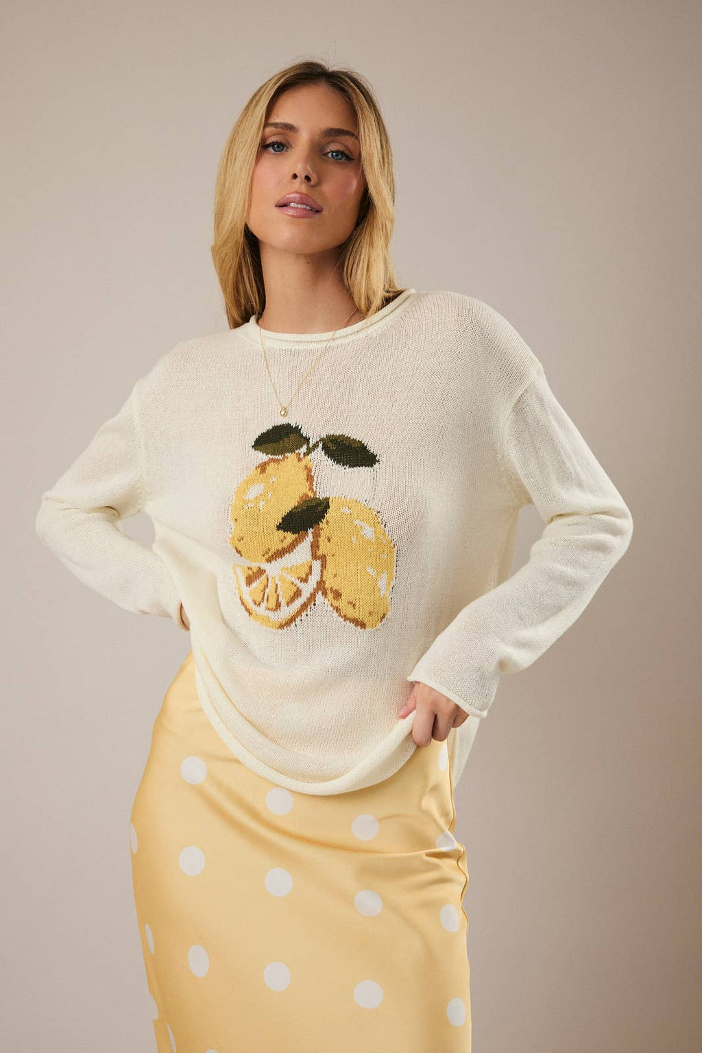 ROUND ROLL UP NECK LEMON GRAPHIC SWEATER