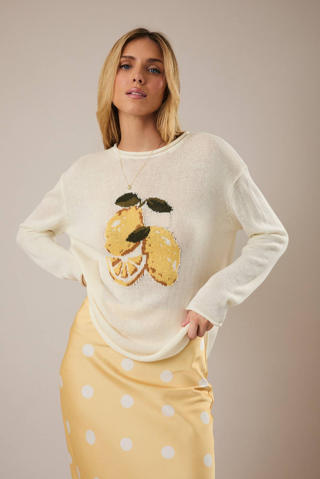 ROUND ROLL UP NECK LEMON GRAPHIC SWEATER