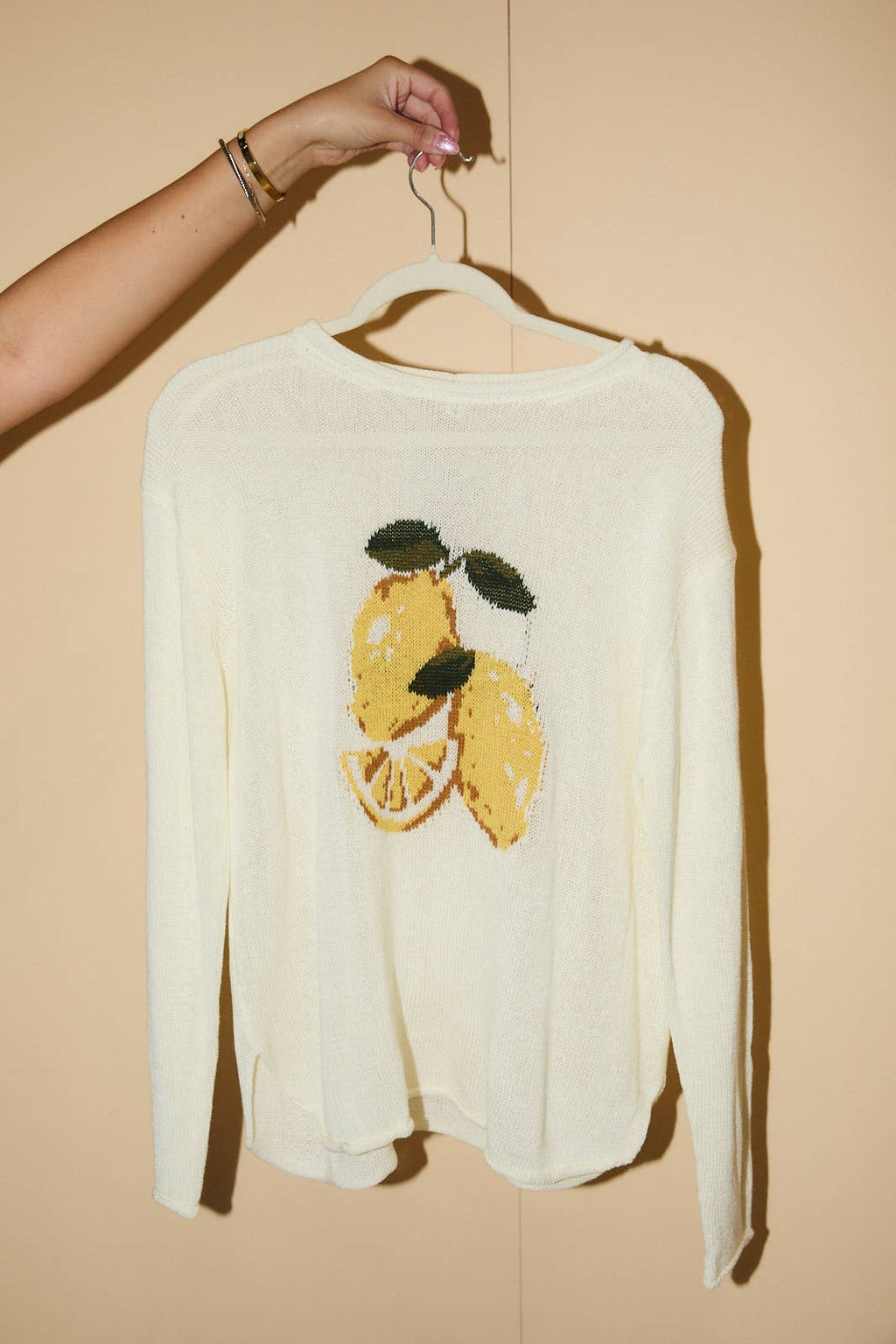 ROUND ROLL UP NECK LEMON GRAPHIC SWEATER
