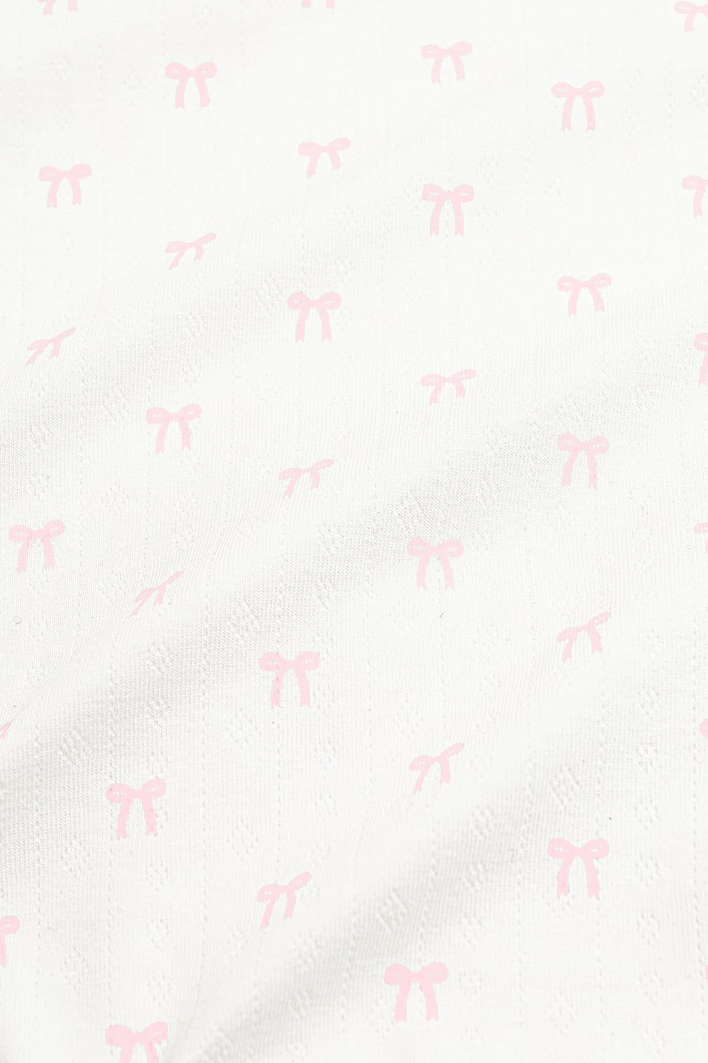Pointelle Zippered Footie in Sweet Pink Bow (Kyte Baby)
