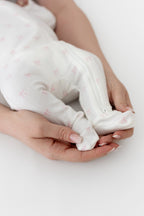 Pointelle Zippered Footie in Sweet Pink Bow (Kyte Baby)