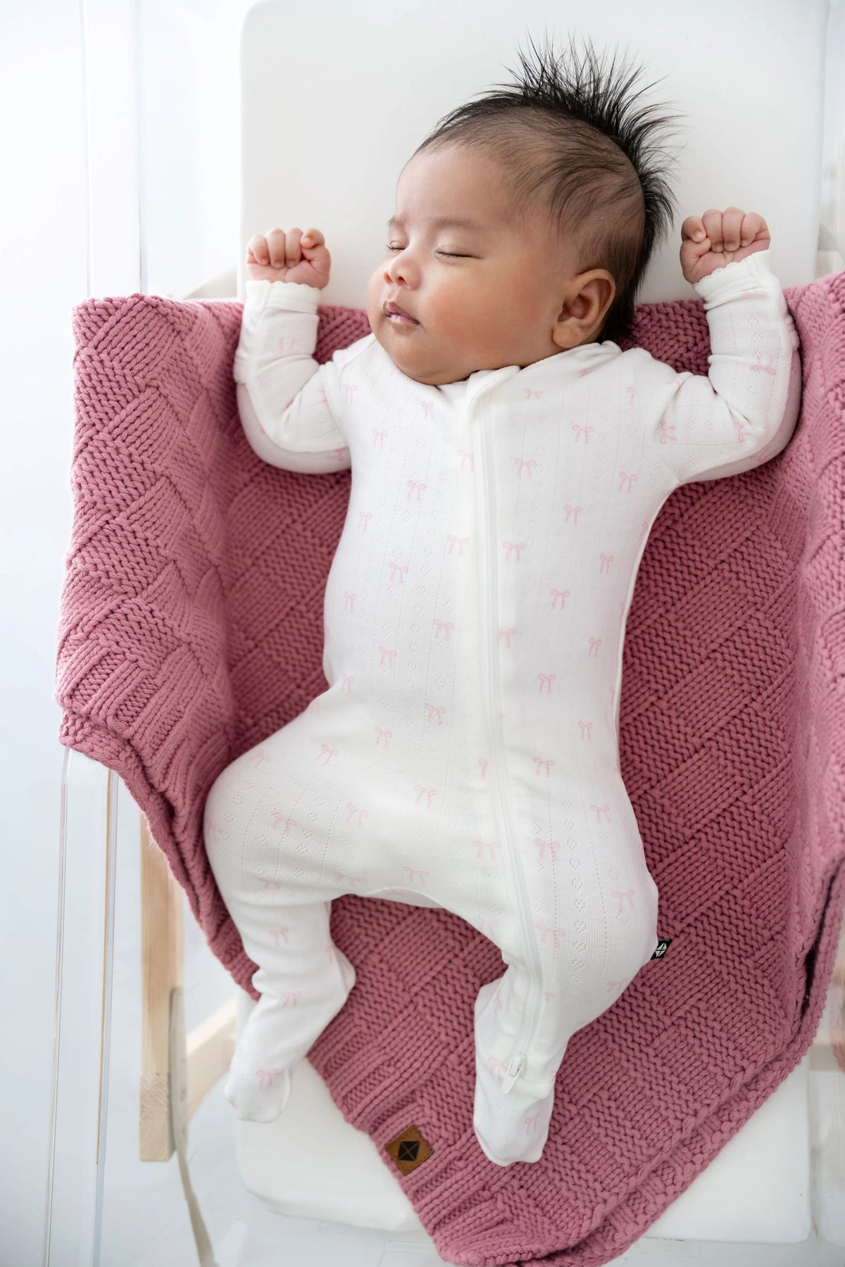 Pointelle Zippered Footie in Sweet Pink Bow (Kyte Baby)