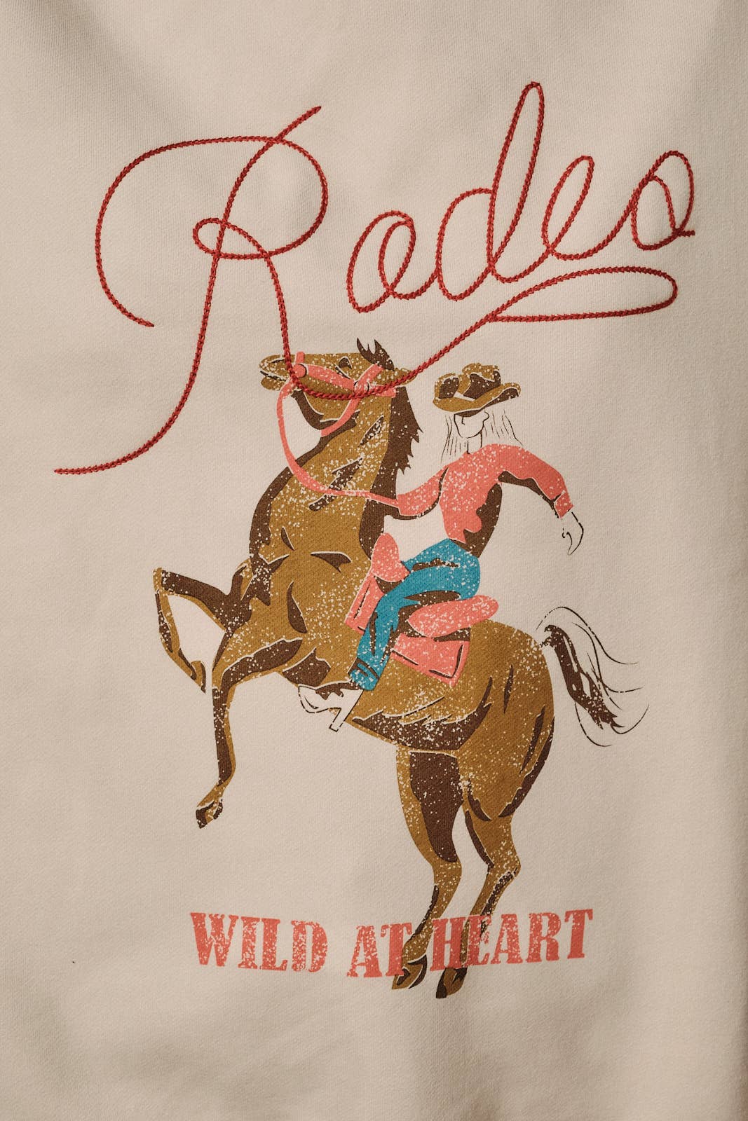 ROUND NECK LONG SLEEVE "RODEO" GRAPHIC SWEATSHIRT