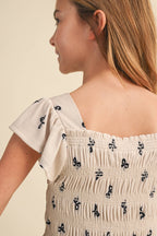 TWEEN GIRLS FLUTTER SLEEVE SMOCKED TOP